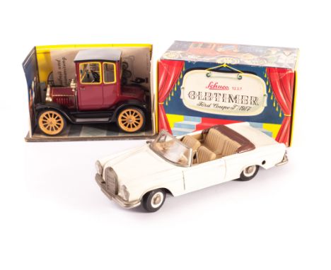 A tinplate and plastic Schuco clockwork Girato 4000 Mercedes Benz 250 SE in off-white with brown tonneau, VG, lacks MB Mascot