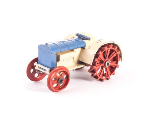 A Pre-War Dinky Toys 22e Farm Tractor, ‘Dinky Toys’ cast-in, with hook, cream/blue body, red wheels, G 