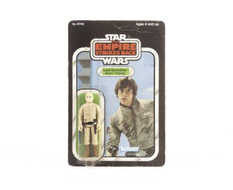 Vintage Kenner Star Wars ESB Luke Skywalker (Bespin Fatigues) 3 3/4” Figure, 32 back unpunched card, contained in protective 