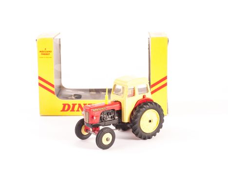 A Dinky Toys 305 David Brown Tractor, yellow cab and hubs, red engine cowl, ‘David Brown 990’ stickers, in original export bo