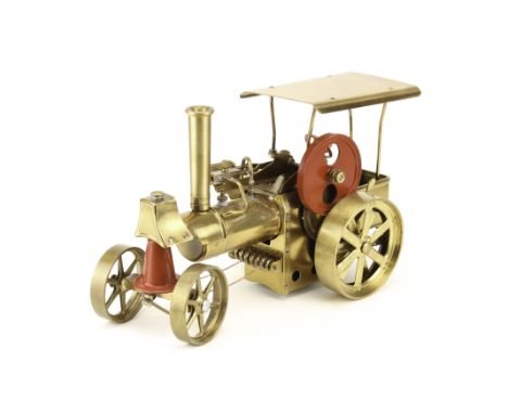 A Wilesco brass finished ‘Old Smoky’ live steam tablet-fired traction engine: with speed regulator, slip-eccentric reverse, w