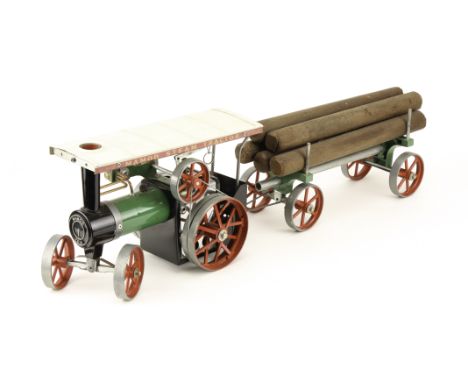 A Mamod TE1A Live Steam Spirit-fired Traction Engine with log trailer: with level plug, spirit burner, steering extension and