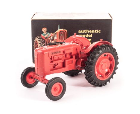 A Pippin Toys Nuffield Tractor, in red plastic, in original box with top and bottom inserts, E, box VG 