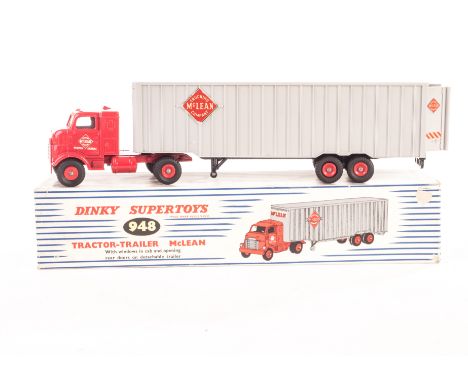 A Dinky Supertoys 948 McLean Tractor-Trailer, red cab, light grey trailer, red plastic hubs, in original box, VG-E, box VG, p