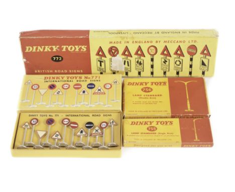 Dinky Toys 771 International Road Signs, 772 British Road Signs, 756 Lamp Standard (Double Arm), 755 Lamp Standard (Single Ar