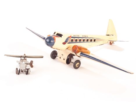 A Mettoy Airways Twin Engine Airplane, in cream with blue and red lining with sparking engine with plastic covers, ref GA-AGX