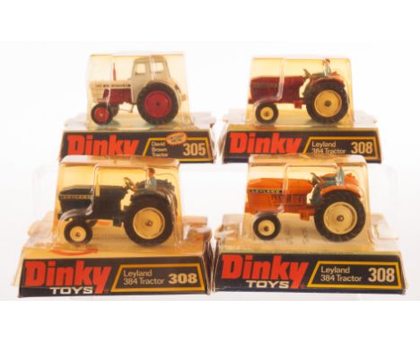 Dinky Toys 308 Leyland 384 Tractor, three examples, metallic red body, orange body, dark blue body, all white hubs, 305 David