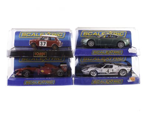 Modern Scalextric Cars, including C3060 Audi R8 LMS Team Phoenix, C3089 Aston Martin DBS, C2964 Lotus 49 Graham Hill and othe