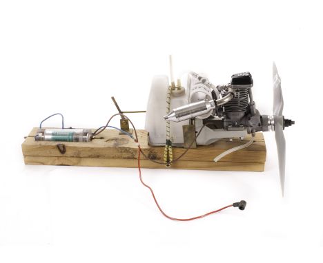 A demonstration/display model of a single-cylinder marine engine: finished in Duralumin metal, with toothed-belt drive to ove