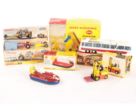 A Dinky Toys 952 Vega Major Luxury Coach, 964 Elevator Loader, mid blue body and plastic hubs, yellow chutes, 370 Dragster Se