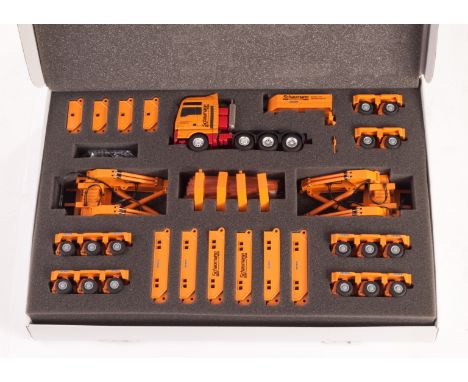 Conrad, MAN TGA XXL Schaumann 4-axle heavy haulage tractor with Goldhofer lift lever 16-axle bridge trailer, Nr.: 66150/0, in