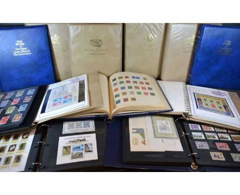 The Favourite Philatelic Album containing stamps of the world, mint and used together with six albums Royal Wedding and five 