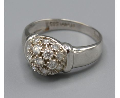 A 14ct White Gold Diamond Cluster Ring set with many diamonds with a dome setting, Size N, 3 grams 