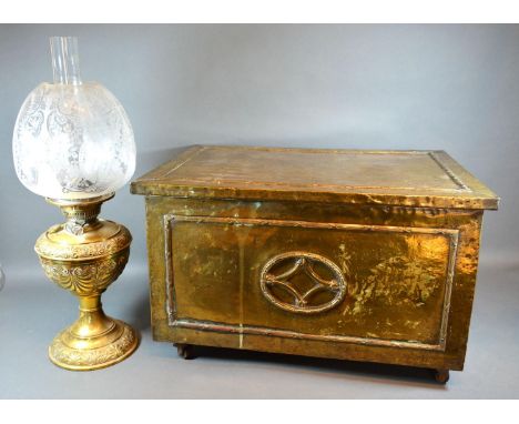 An Edwardian Brass Oil Lamp with opaque glass shade and chimney together with a brass coal purdonium 