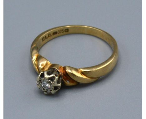 A 9ct Yellow Gold Solitaire Diamond Ring set with single diamond within a pierced setting, Size N, 2.5 grams 