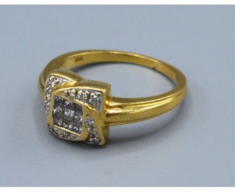 A 18ct Yellow Gold Diamond Cluster Ring set with many diamonds in a square setting, Size N, 4.6 grams 