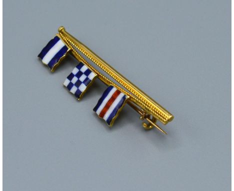 A 18ct Gold Tie Pin Enamel decorated with three flags, 4cm long, 5.4 grams 