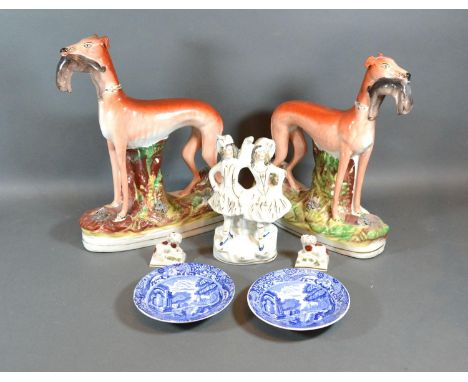 A Pair of Staffordshire Models of Greyhounds together with a Staffordshire group, a pair of small Staffordshire Spaniels and 