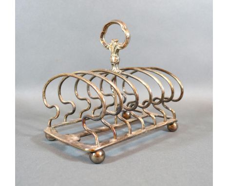 A Victorian Silver Six Division Toast Rack of Shaped Form with Handle, London 1849, maker R&amp;S Garrard &amp; Co. 14 ozs. 