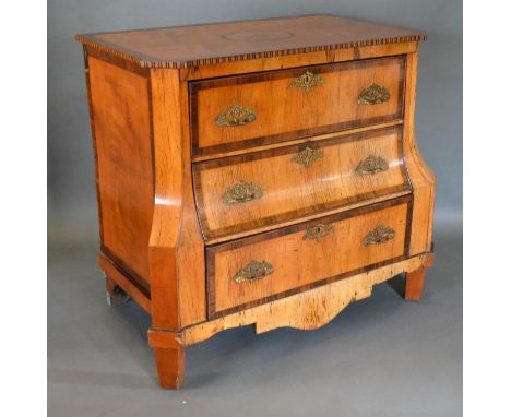 An 18th Century Dutch Satinwood Marquetry Inlaid Commode, the crossbanded top with central oval foliate marquetry above three