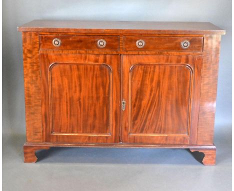 A 19th Century Mahogany Chiffonier with two frieze drawers above two panelled doors, raised upon bracket feet, 121 cms wide, 
