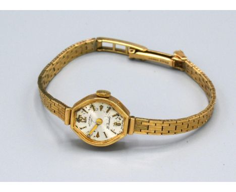 A Rotary 9ct. Gold Cased Ladies Wristwatch with 9ct. Gold Strap, 11.3 gms excluding movement 