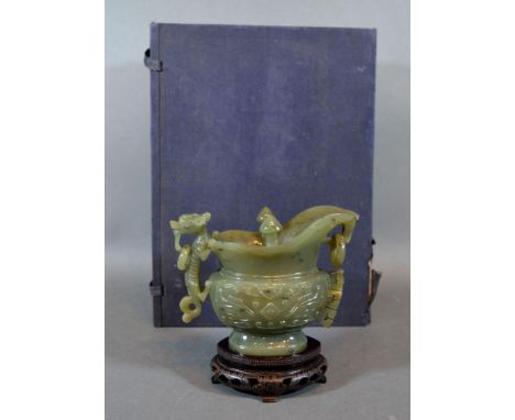 A 20th Century Chinese Jade Model in the Form of a Jug with hardwood stand and original box 11cm tall 