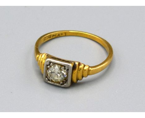 An 18ct. Gold Solitaire Diamond Ring approximately 0.40 ct. within a square setting, ring size P, 3 gms. 