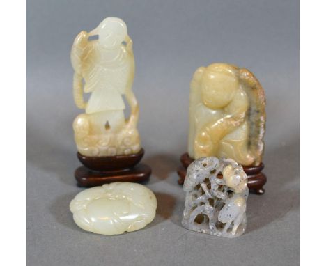 A Chinese Jade Carved Model in the Form of a Figure 8cm tall together with three other similar Jade carvings 