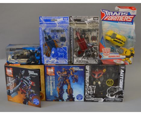 Seven Hasbro/Takara Tomy Transformers items, includes: two Sci-Fi Revoltech figures; Alternity Nissan GT-R; two Animated figu