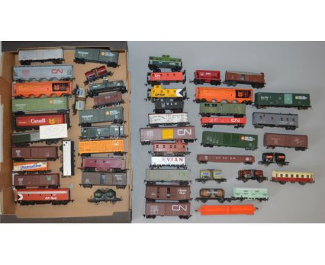 H0 Scale. 50 x assorted unboxed rolling stock, Canadian Railway & Continental types. Overall F/G some with slight damage.