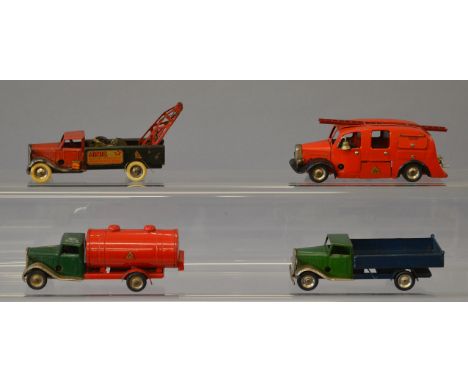 Four unboxed tinplate clockwork Minic vehicles, three long bonnet trucks including a  Pre-War Breakdown Truck, together with 