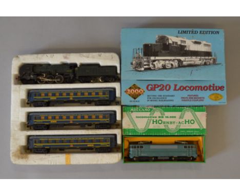 H0 scale. Playcraft SNCF pacific with wagon lits coaches, together with Meccano AcHO SNCF electric locomotive & GP20 Hudson B