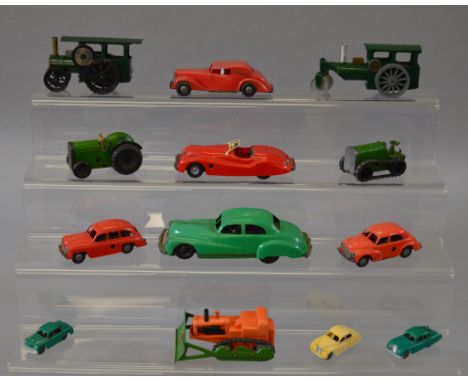 Five unboxed vintage  Tri-ang Minic clockwork models, including  post war versions of the 33M Steam Roller and 44M Traction E