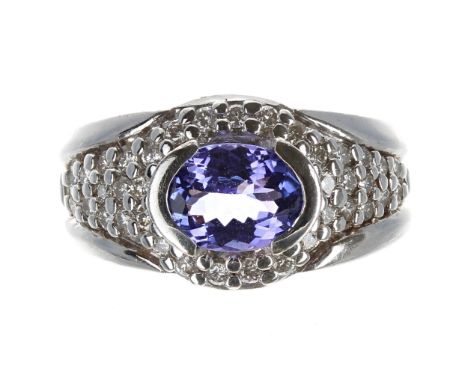 Attractive modern 14ct white gold tanzanite and pavé diamond ring, the tanzanite of good colour estimated 1.30ct approx, in p