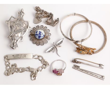 Collection of silver jewellery to include Large shield type silver brooch, silver gate bracelets, bangles, dress rings etc. 