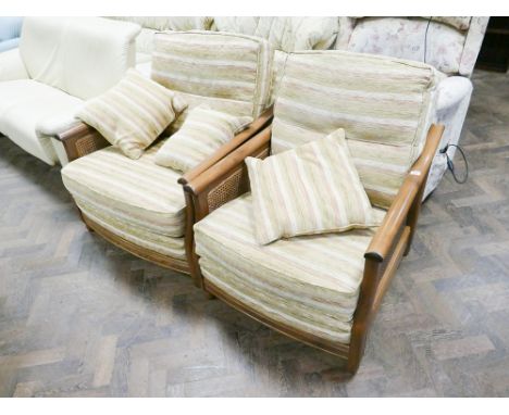 Pair of Bergere cane panel arm chairs with gold loose cushions 