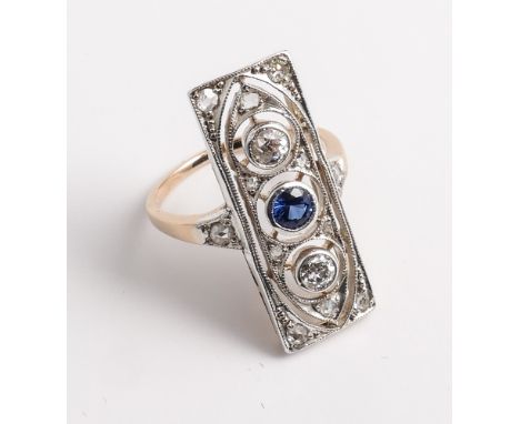 Art deco sapphire and diamond ring, the large rectangular panel set with 2 brilliant cut diamonds and one central sapphire wi