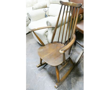 Ercol stick back rocking chair of small size 