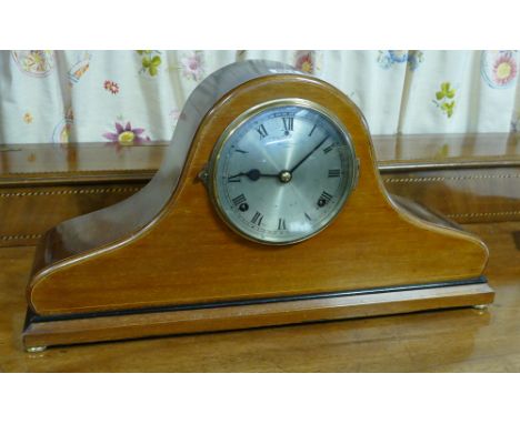 Striking mantel clock in Napoleon style mahogany case 