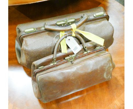 Two vintage brown leather Gladstone bags 