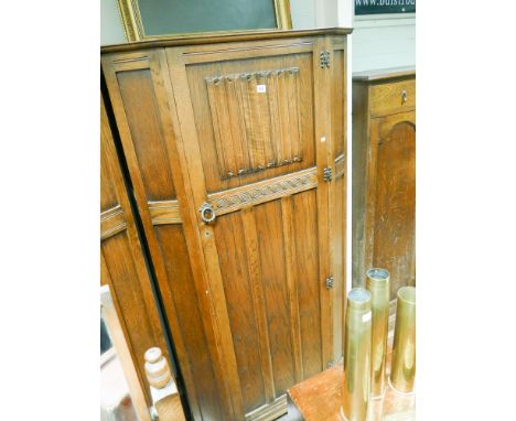 Reproduction oak linen fold panel hall wardrobe 