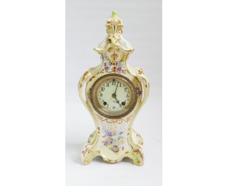 Late Victorian striking mantel clock in shaped violet decorated case 16" tall 