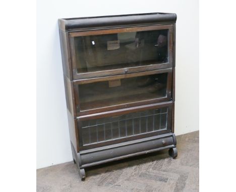 3' three section Globe Wernicke style bookcase with one leaded glazed panel and drawer under 