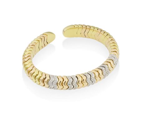 BRACELET OR ET DIAMANTSDe forme jonc, serti de diamants taille brillant, poinçon français d'occasion pour l'or 18K (750°/00),