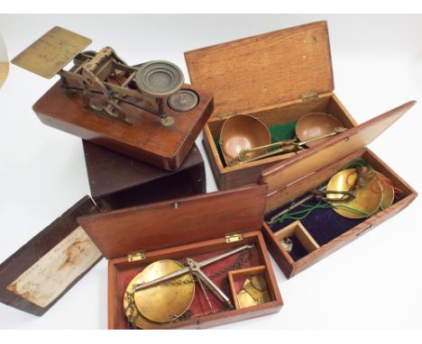 3 boxed sets of brass balance scales and a letter scale in box 