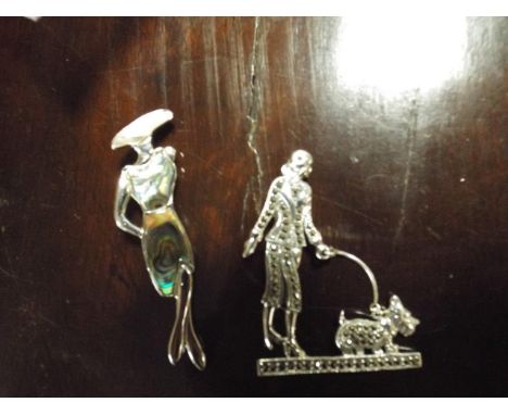 Marcasite brooch, lady walking dog and an enamel brooch in the Art Nouveau style 