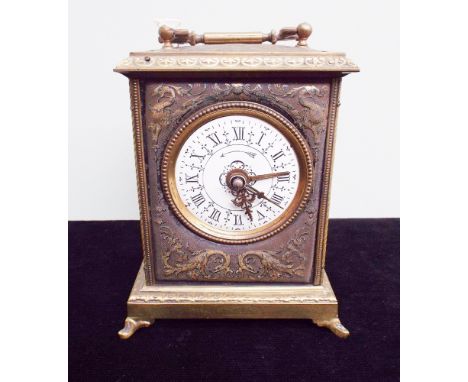 19th century French brass carriage/alarm clock stamped to the back Grand Prix De L'Horlogerie 1878, with white enamel dial, r