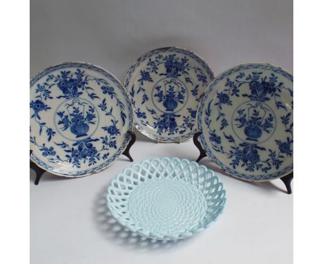 3 matching early Delftware blue and white plates, simply painted with flowers in a basket design, 9 inch diameter and a Sower