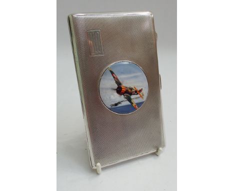 1940's silver cigarette case, engine turned decoration, applied circular plaque depicting Spitfire, enscribed to the inside '